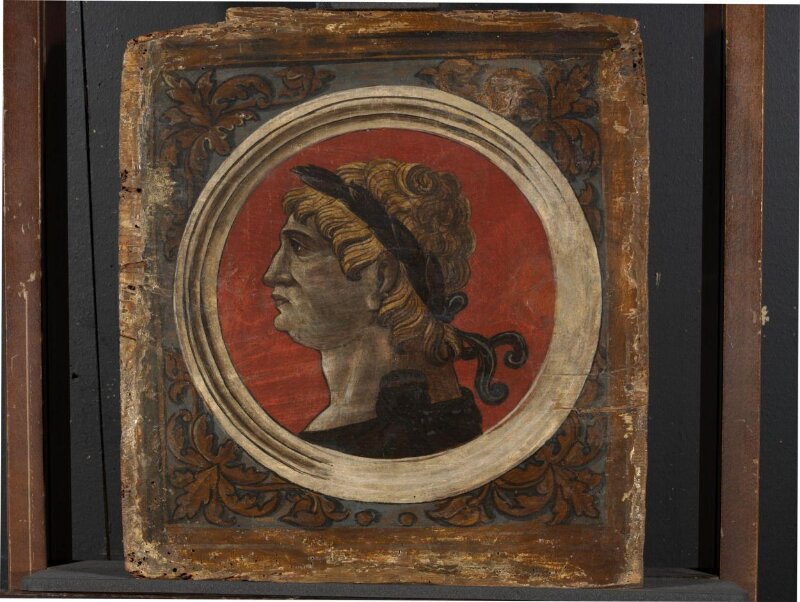 Profile of a laureated bust of a Roman emperor facing left