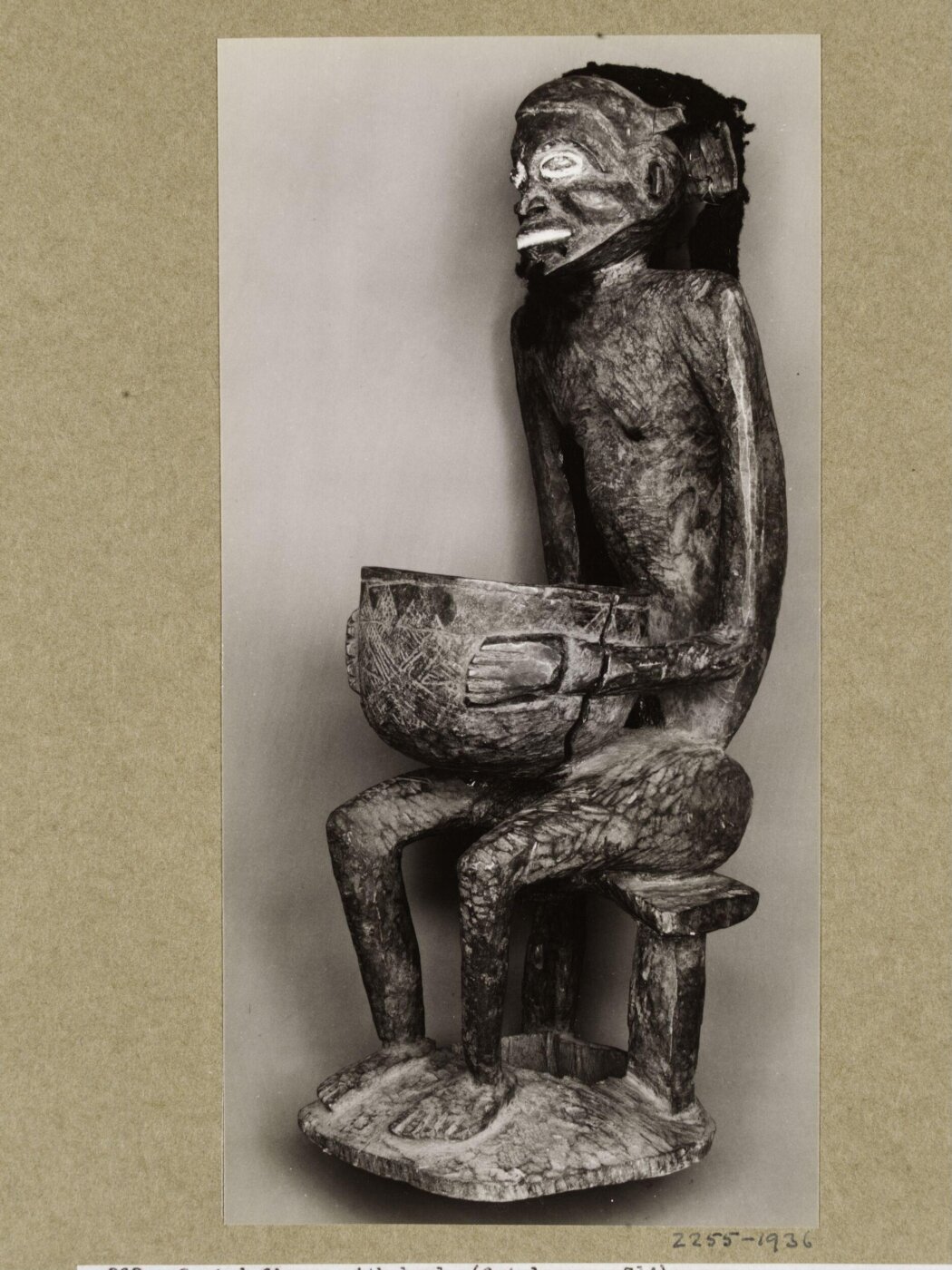 Walker Evans, Seated figure with bowl. Bafum