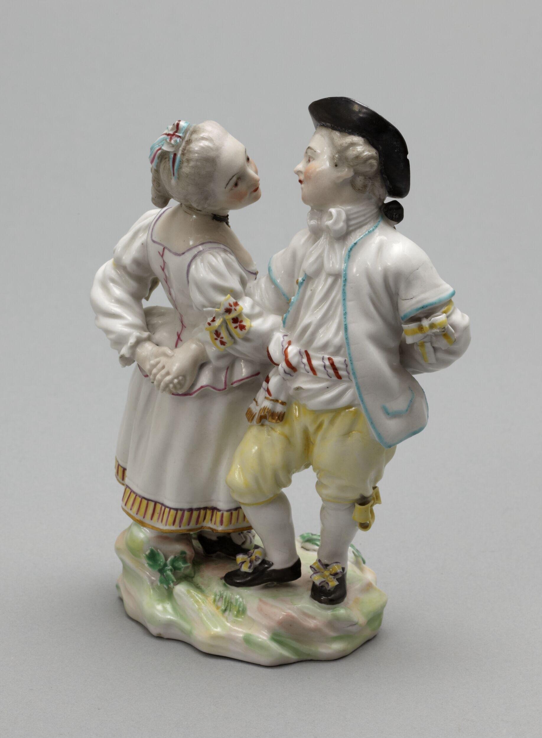 Boy and girl dancing a reel by William Duesbury & Co.