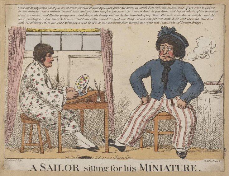 A sailor sitting for his minature top image