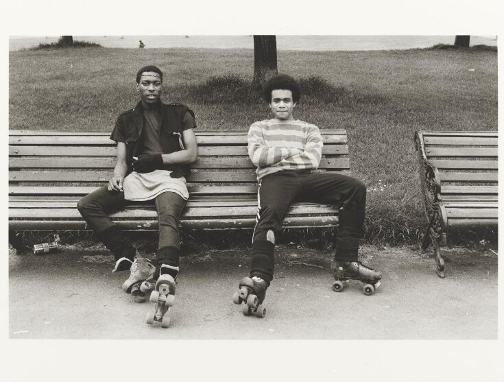Untitled [two men with roller skates sitting on bench] from the series On a Good Day top image