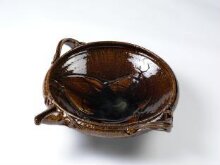 Pair of large spouted bowls in similar shapes and different glazes thumbnail 1