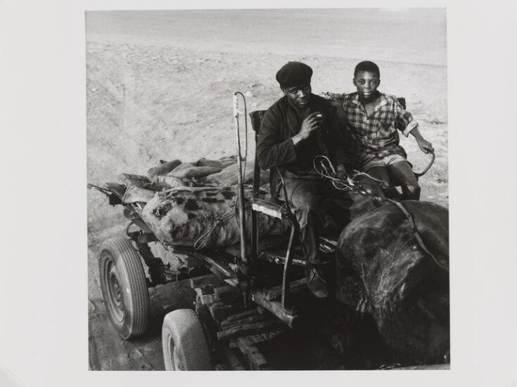 A coal merchant and his son, Thadi, Soweto top image