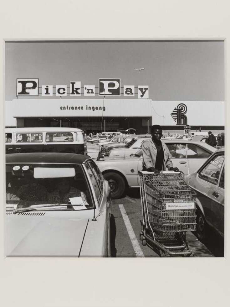 Hypermarket employee collecting trolleys, Boksburg top image
