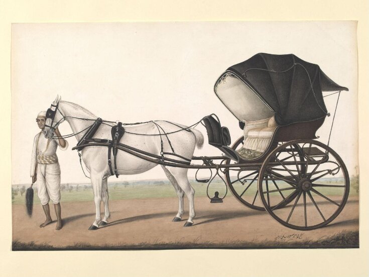 A groom with a horse and carriage top image