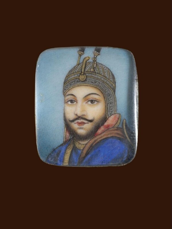 A wooden panel containing ten ivory miniatures, formerly mounted in two bracelets, depicting Indian rulers.