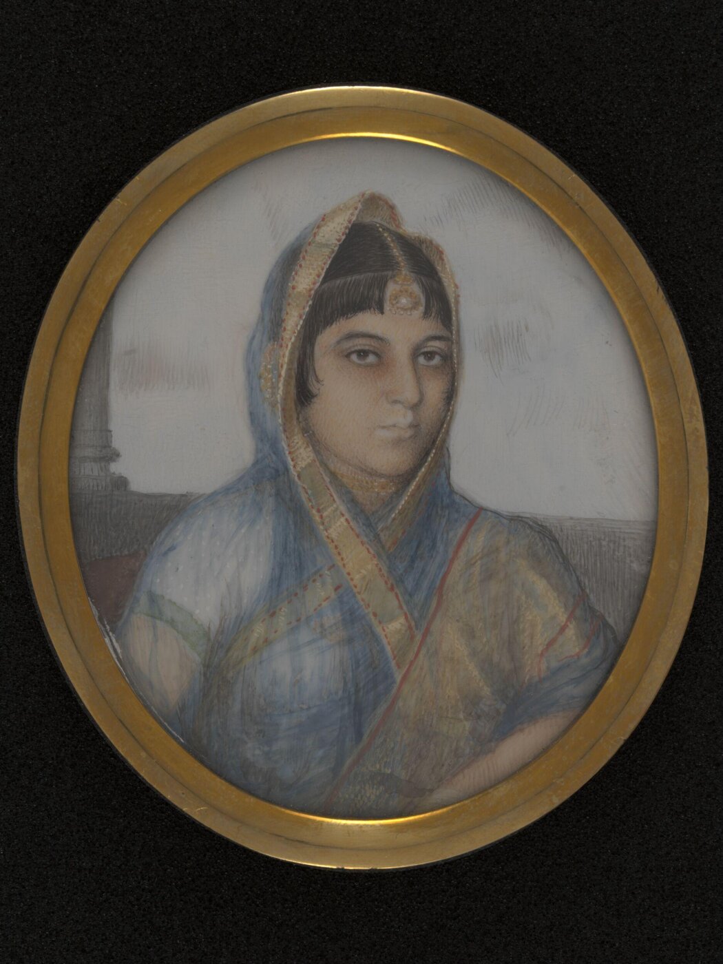 Unknown, A lady in a blue, gold-edged sari.
