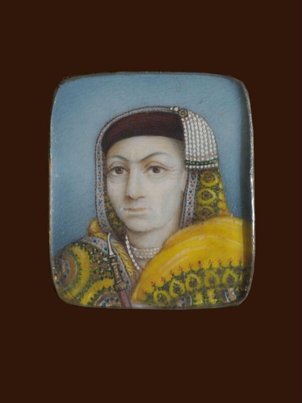 A wooden panel containing ten ivory miniatures, formerly mounted in two bracelets, depicting Indian rulers.