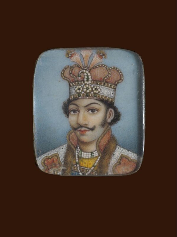 A wooden panel containing ten ivory miniatures, formerly mounted in two bracelets, depicting Indian rulers.