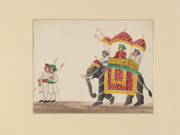 An elephant with double-canopied howdah top image