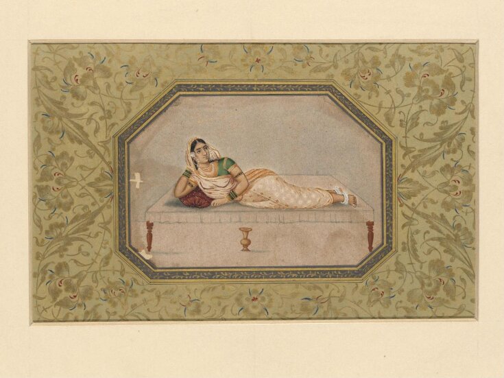 A lady reclining top image