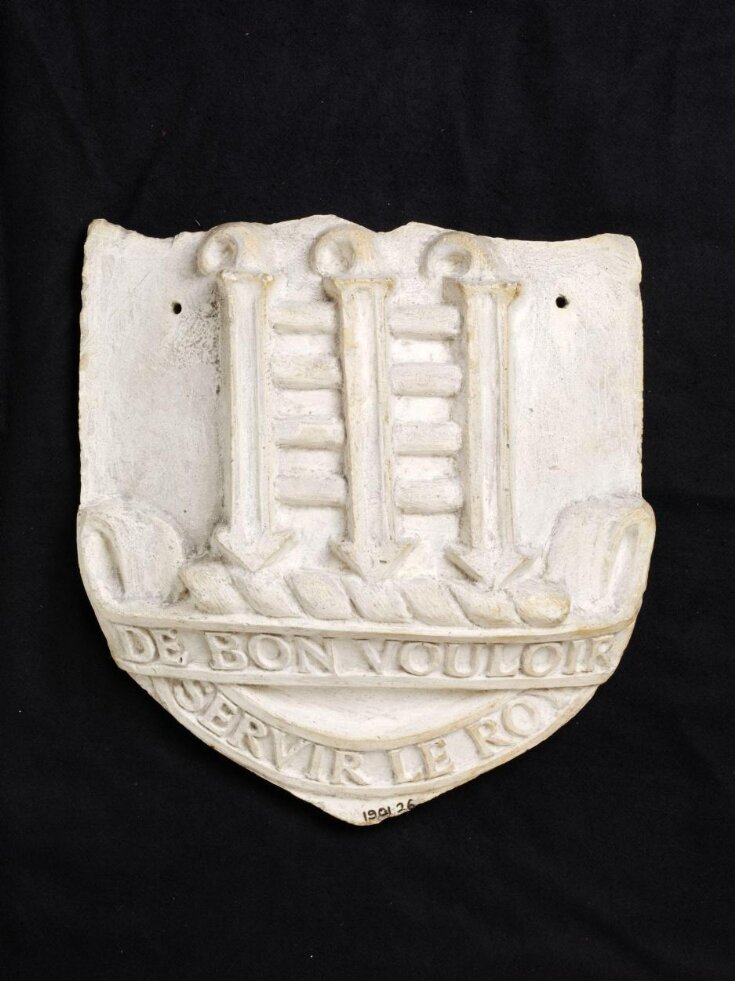 Cast from one of the shields on the Royal Albert Hall top image