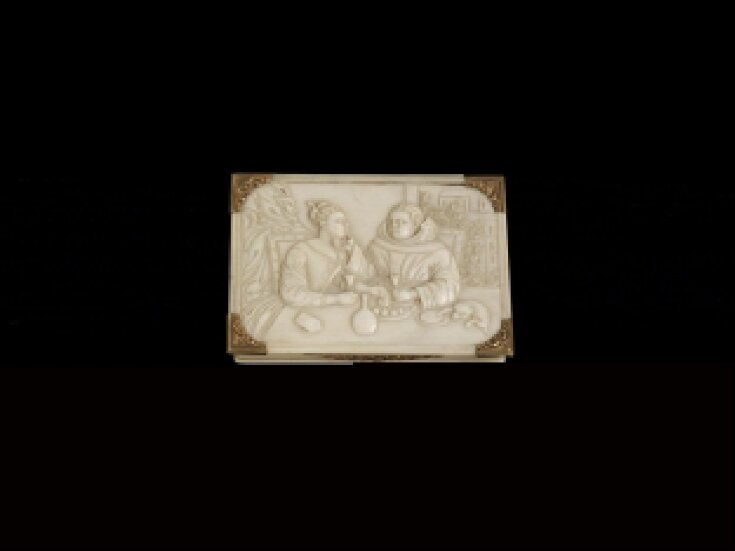 Box with scene of a monk and lady at a table top image