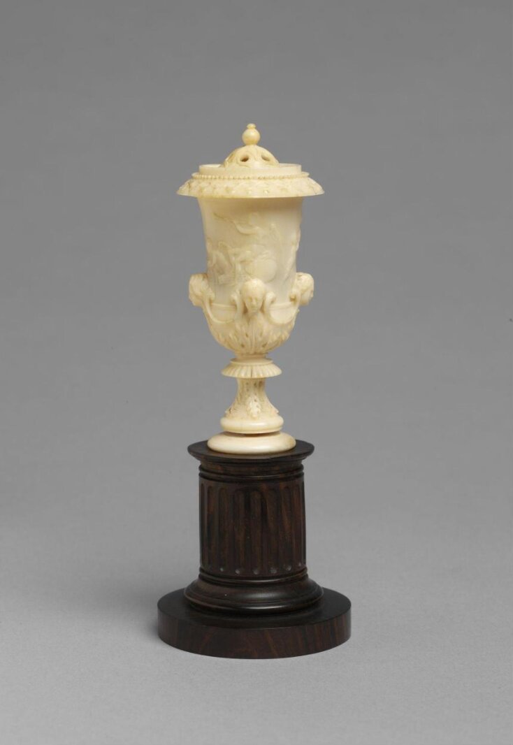 Vase or urn top image