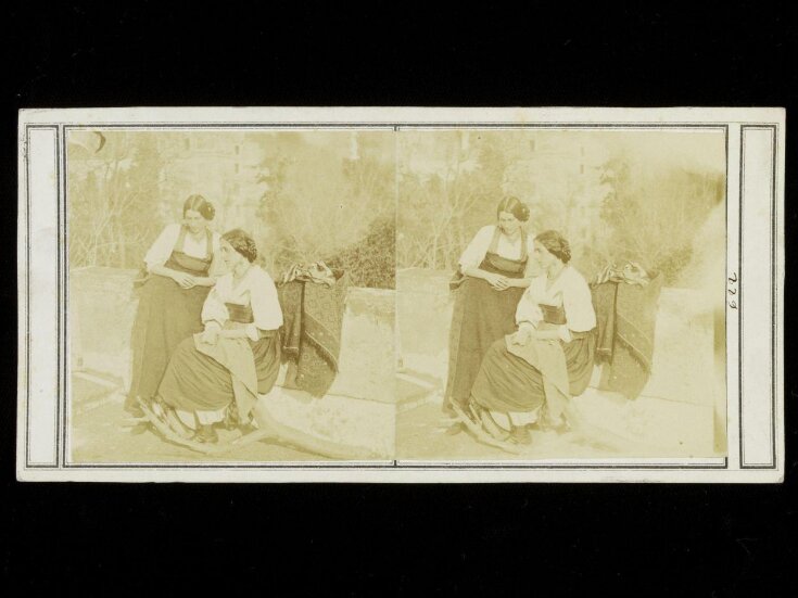 Stereoscopic photograph of a two women in traditional costume (Italy) top image