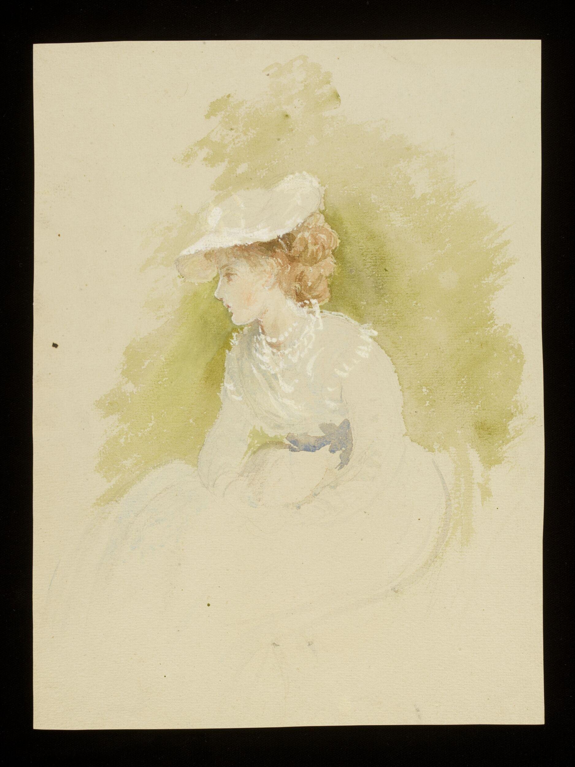 A lady seated outside