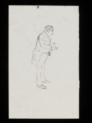 A man standing in formal dress