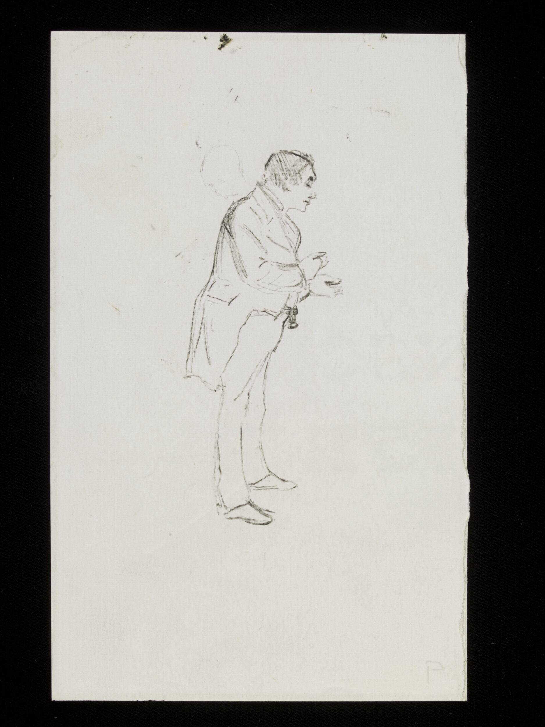 A man standing in formal dress