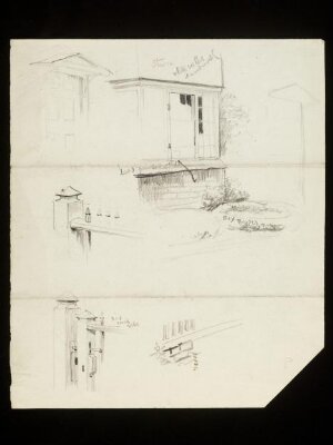 The front door and bay window of a house and railings