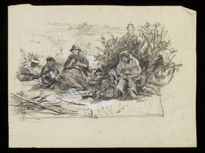 Men sitting in a field