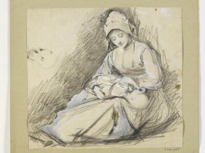 Seated woman nursing a baby