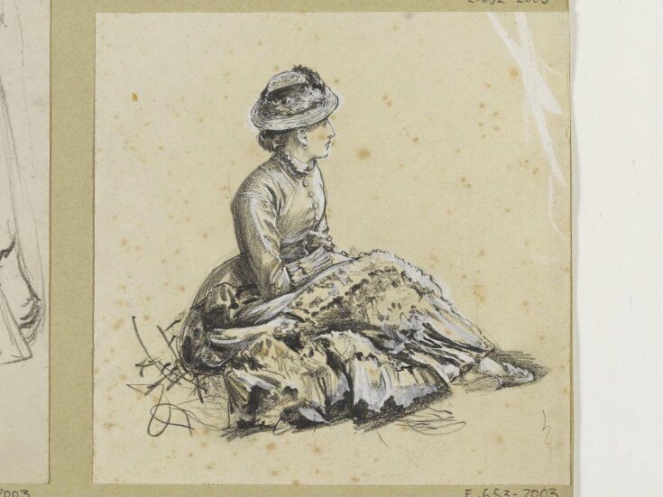 Seated woman in profile top image