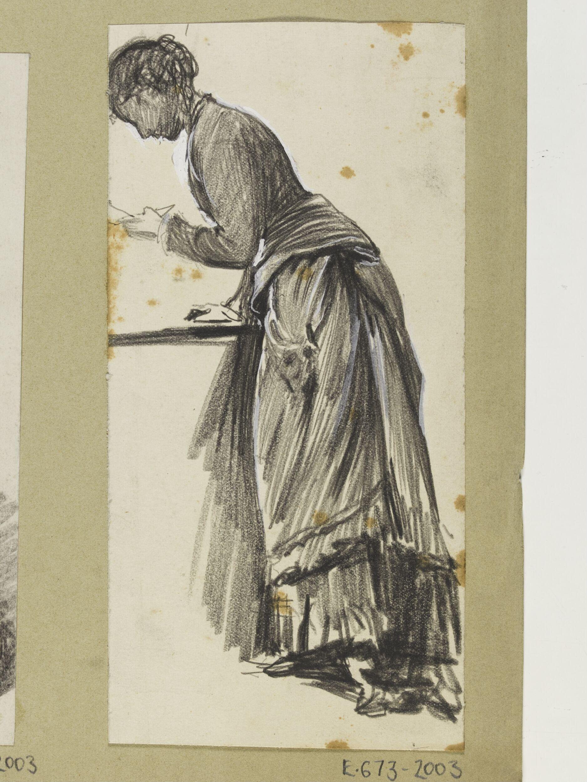 Woman leaning on a table