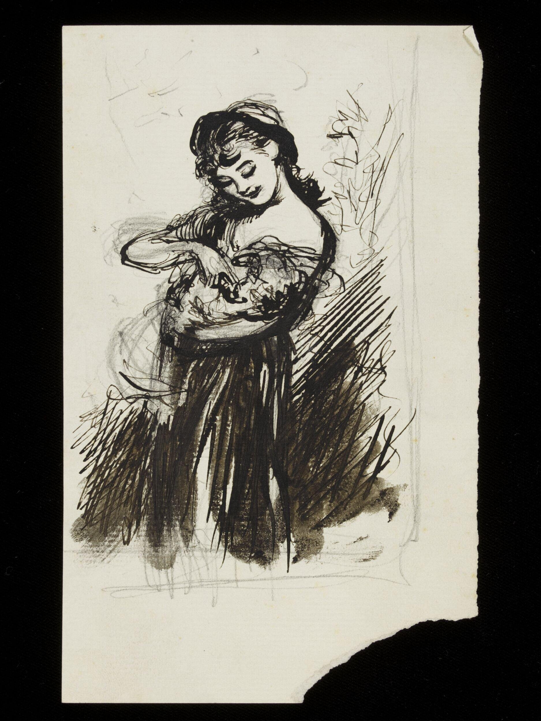 A Young girl holding an animal