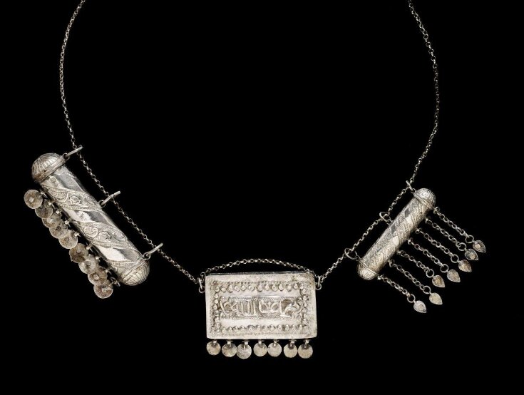 Necklace with amulet cases top image