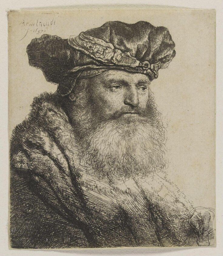 Bearded man in a velvet cap with a jewel clasp top image