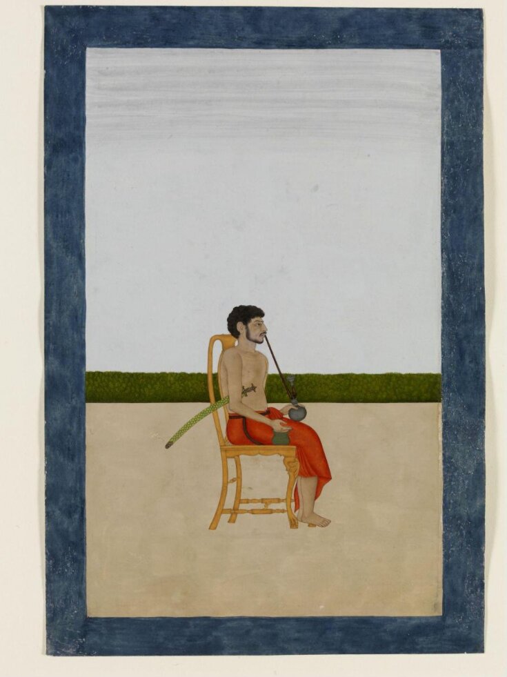 A male member of William Fullerton's household seated on a European chair smoking a 'huqqa' and holding a sword and a 'lota' top image
