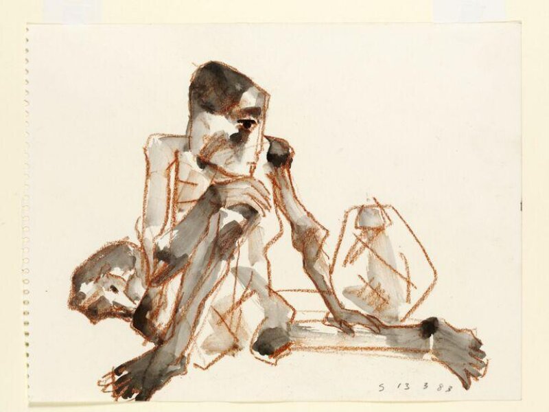 Seated Tribesman among Rocks