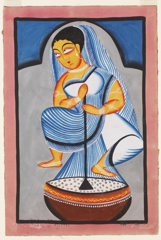 A woman churning milk