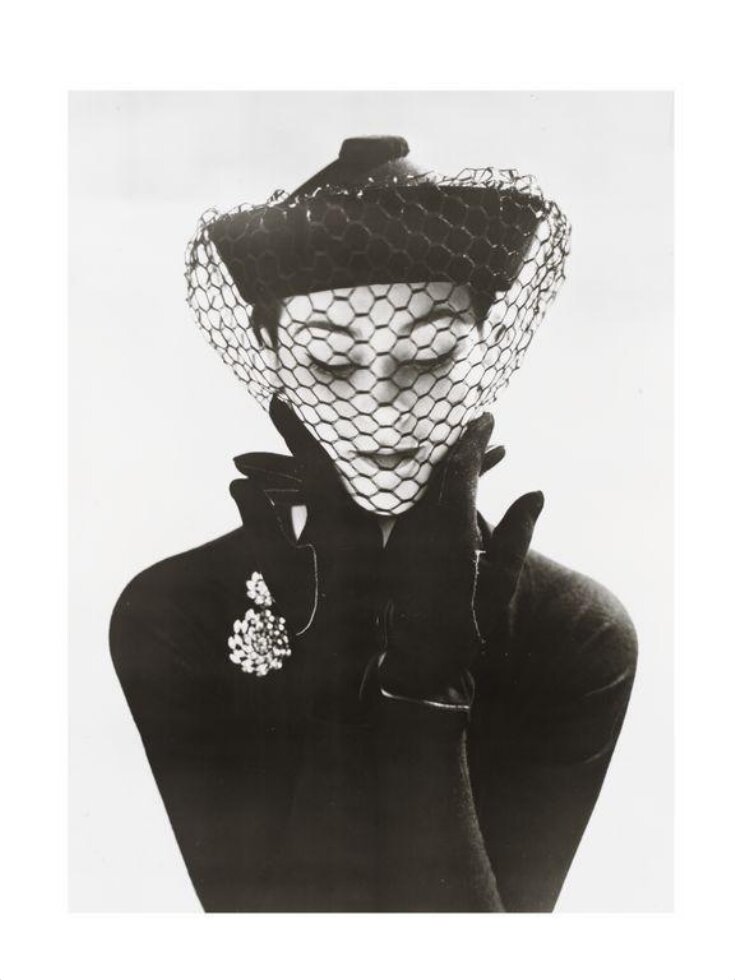 Model wearing a black veil top image