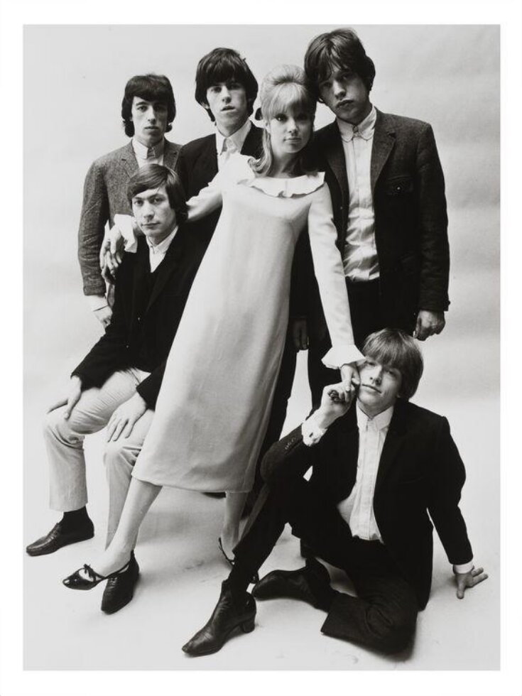 Patti Boyd wearing a Mary Quant dress, photographed with the Rolling Stones top image