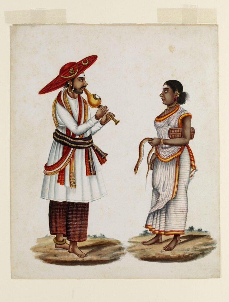 A snake charmer and his wife top image