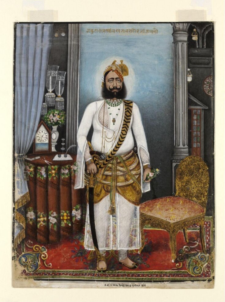 Portrait of Thakur Raja Bakhtawar Singh, standing in a European-style interior. top image