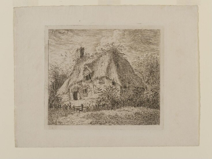 An Old Thatched Cottage with Hedge and Paling in Front. top image