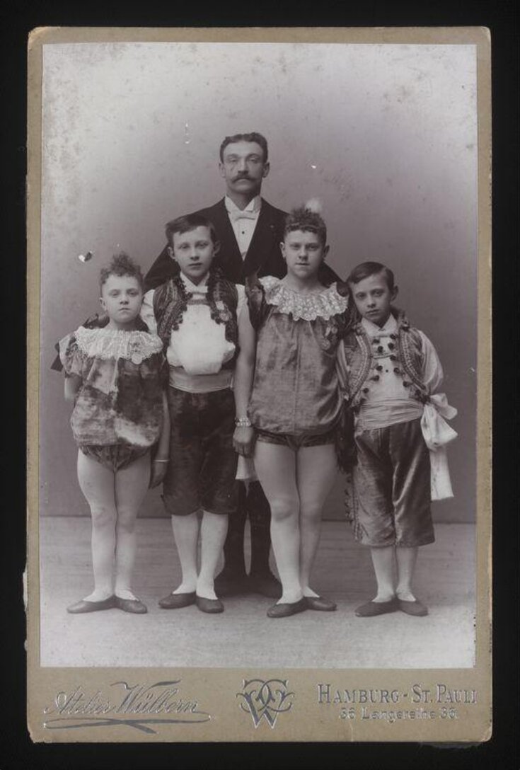 Photograph of the acrobat Edwin Moxon and his eldest children top image