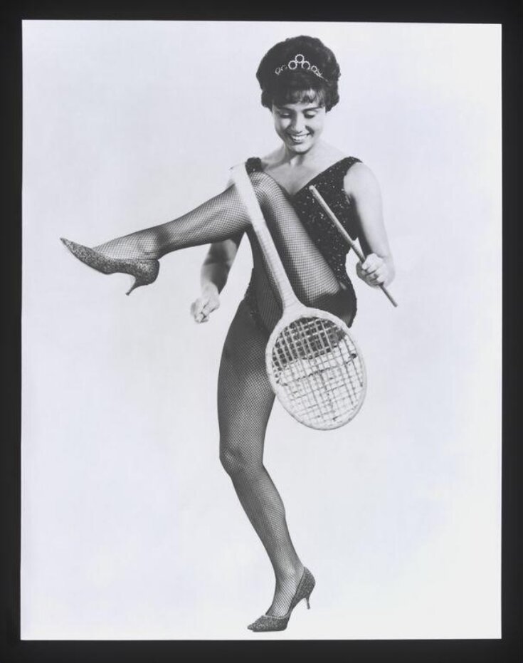 Judy Moxon performing a tennis racquet juggling act top image