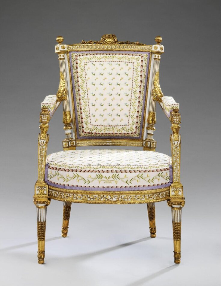 LOUIS XVI STYLE CARVED AND PAINTED RIBBON ARM CHAIR