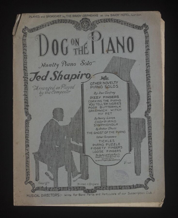 Dog on the Piano image
