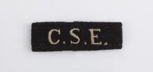 Wartime uniform shoulder tabs for a member of the Combined Services Entertainment Unit thumbnail 1