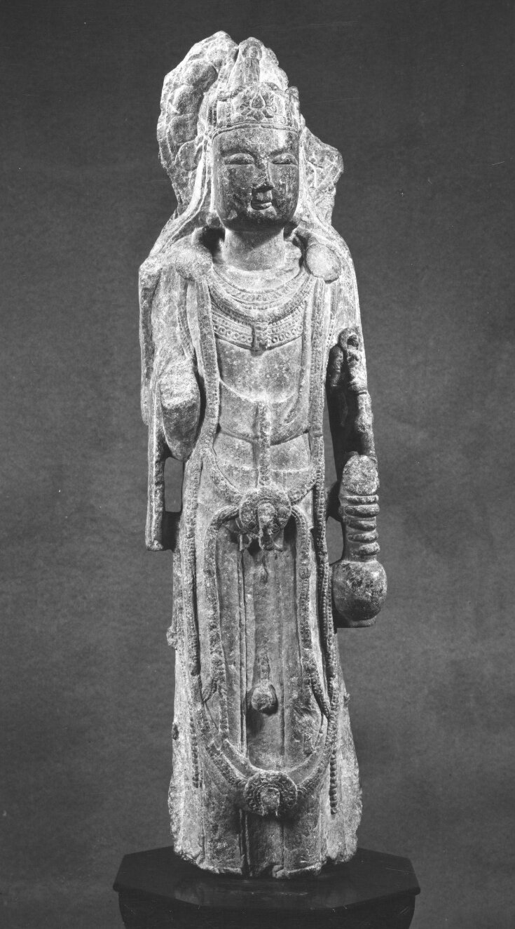 The Bodhisattva Guanyin holding a vase top image