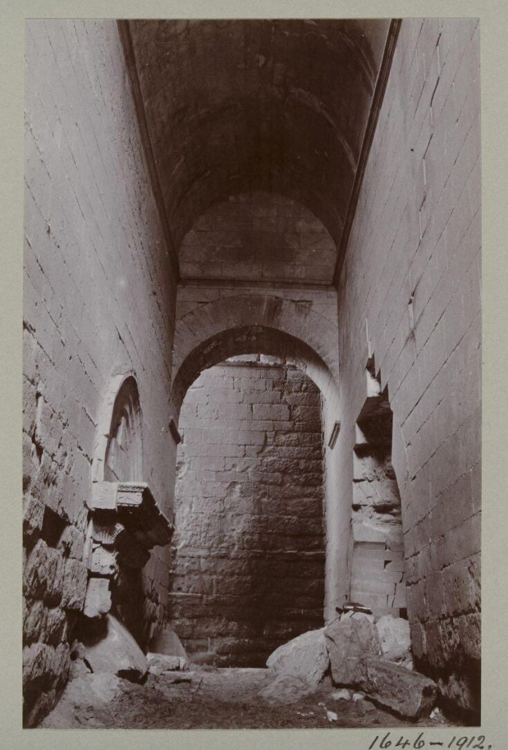 Vaulted east passage with carved lintel and arch in the ruins of the Great Iwan at Hatra, Iraq top image