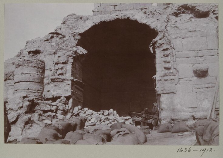 Soldiers in the arched entrance to Room 1 in the ruins of the Great Iwan at Hatra, Iraq top image