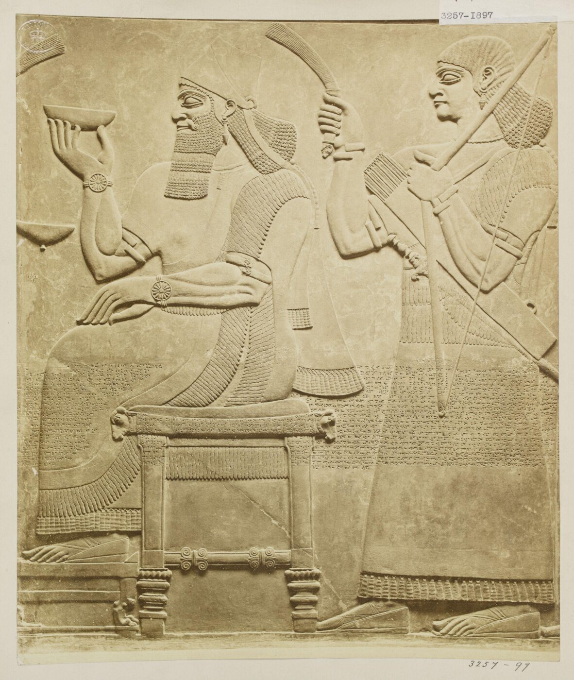 Unknown, Sculpture, relief of figure seated with attendant. London: British Museum