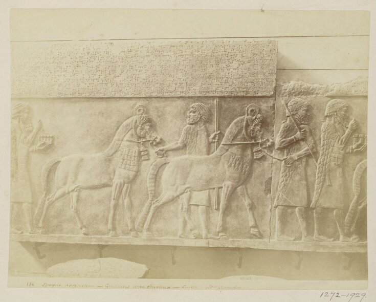 Assyrian bas-relief of warriors with tribute of horses from Palace of Khorsabad, period of Sargon II (722-705 B.C.).  Paris:  Louvre top image