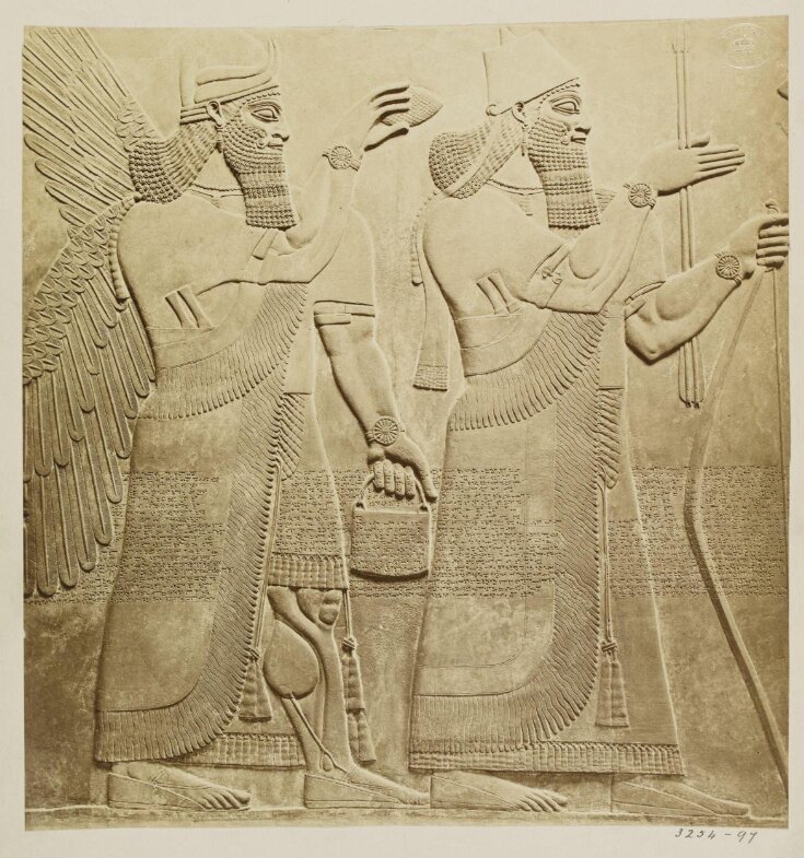 Assyrian relief of King Ashurnasirpal II and a god from Nimroud, ca. B.C. 884. London, British Museum top image