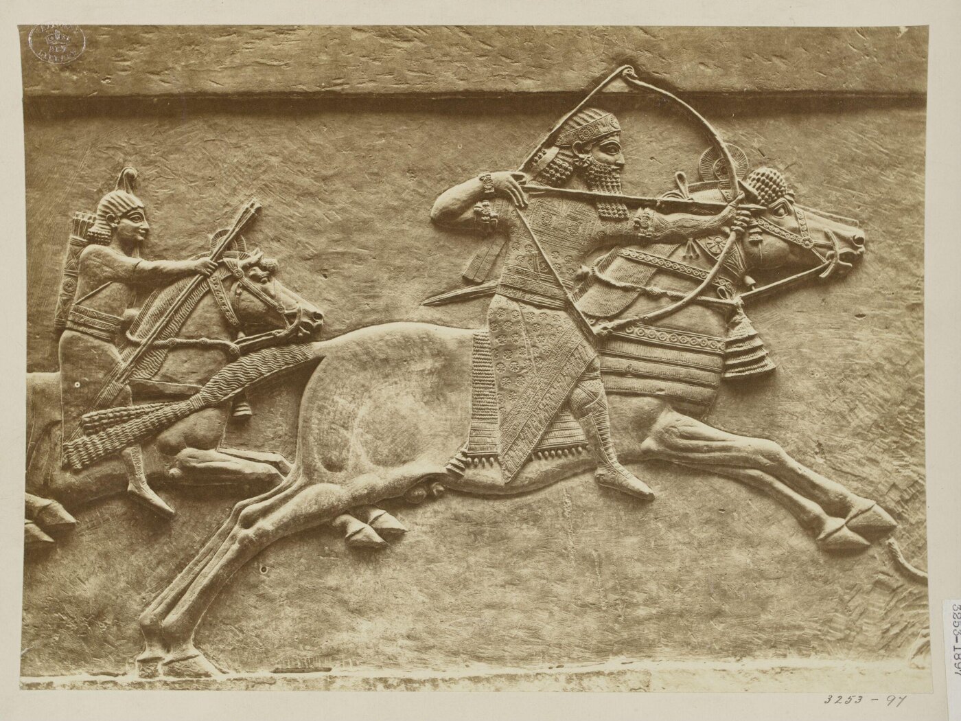 Unknown, Relief depicting Assyrian warriors on horseback armed with bow and arrows. London, British Museum